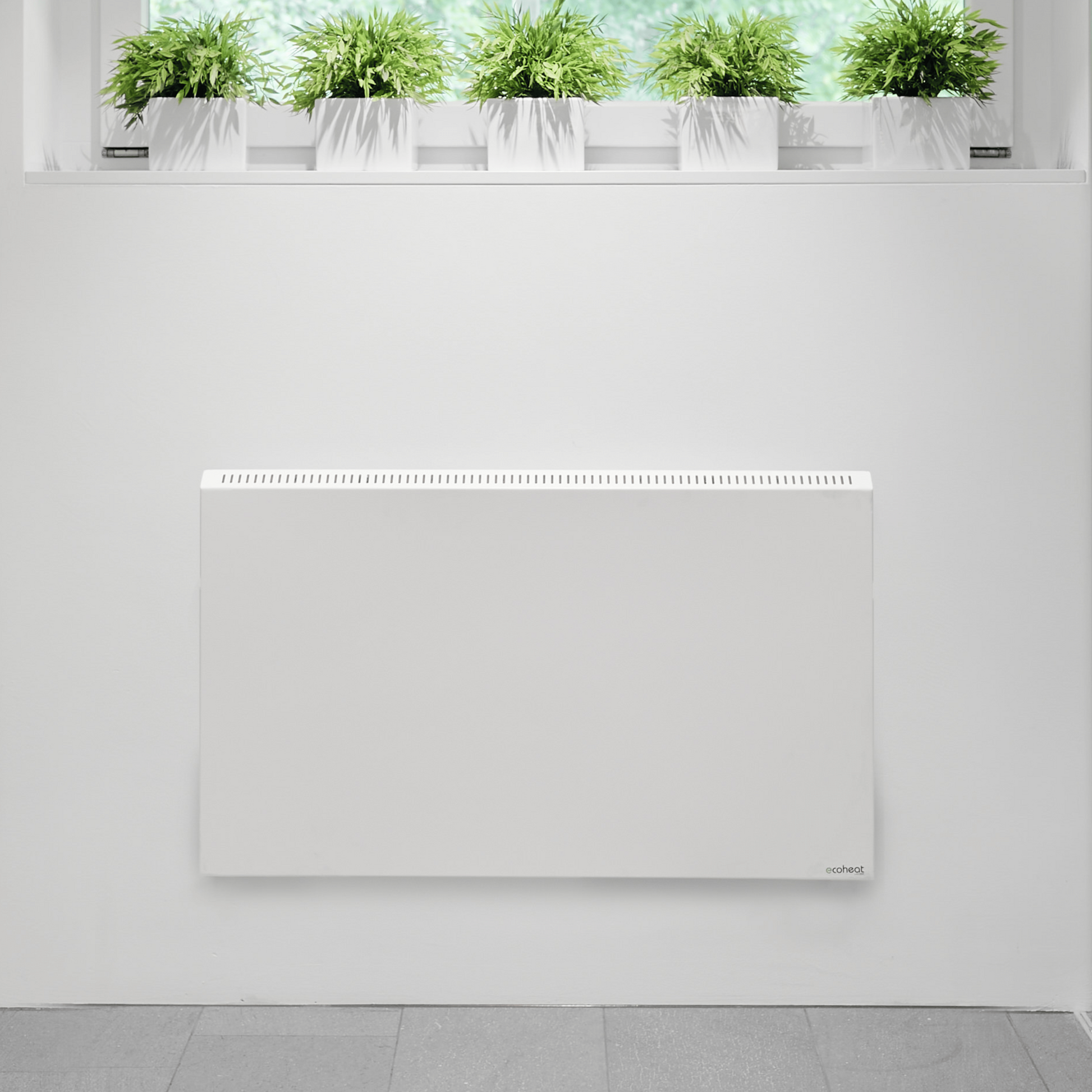 ecoheat Hybrid 1000 Heizung mit 1000 Watt, Wandmontage, Metalloberfläche und einfacher Bedienung.