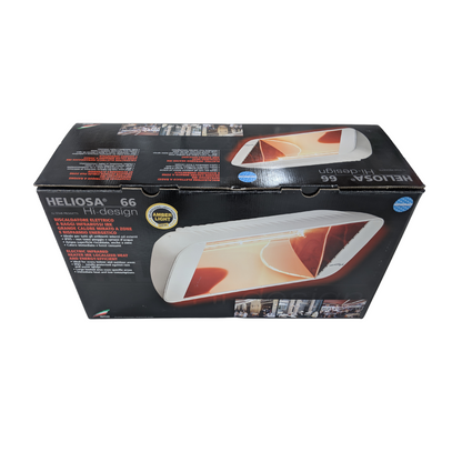 Heliosa 66 Amber Light Infrarot-Heizstrahler in Weiss an der Wand montiert, mit IPX5 Wasserstrahl-Schutz.